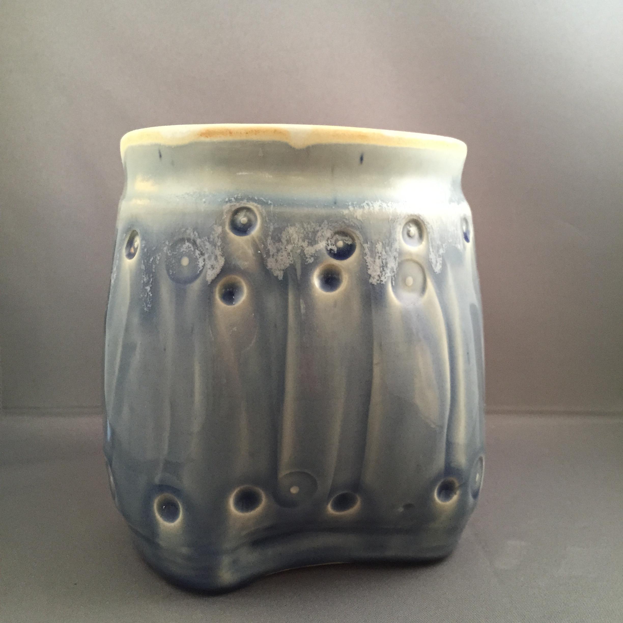 thrown and altered vase